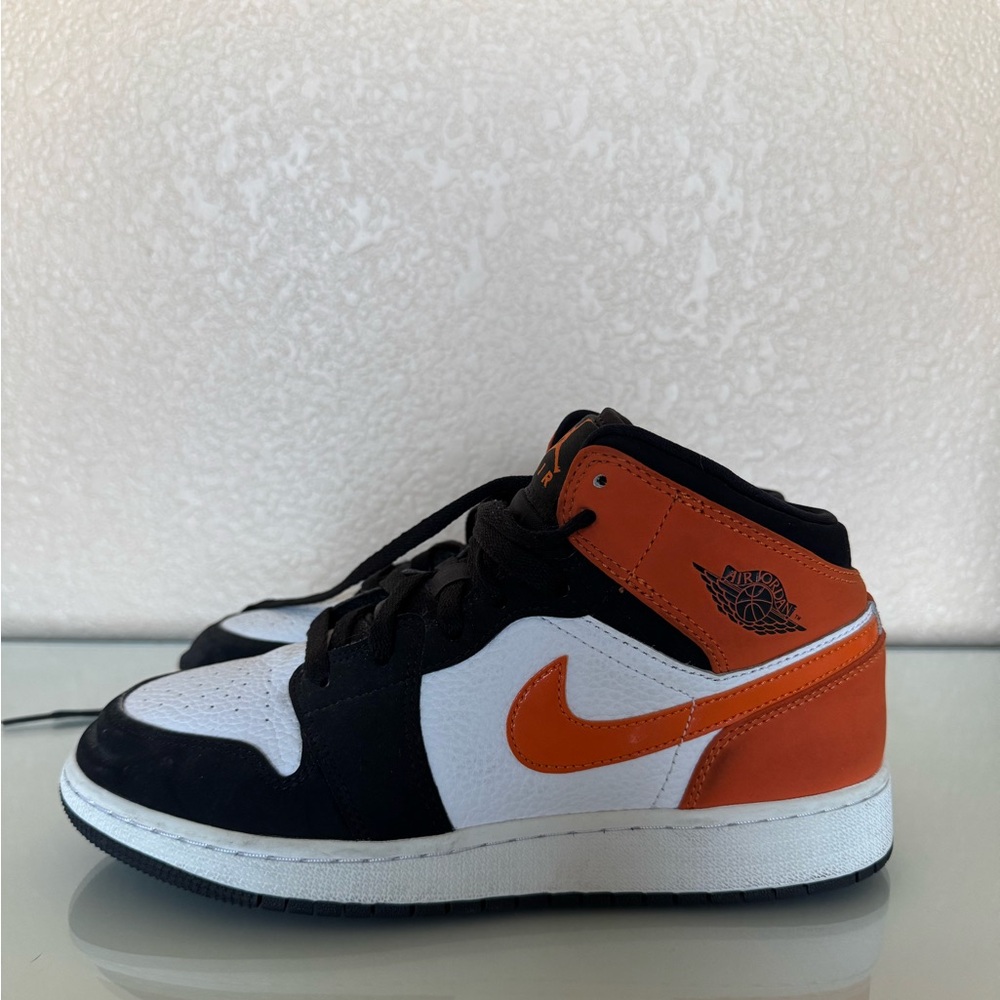 Black and Orange Jordan Sneakers